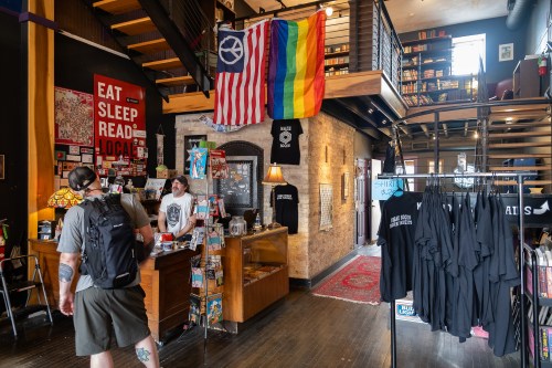 A customer talking to bookseller Dave Pedersen at Maze Books in Rockford, IL. 